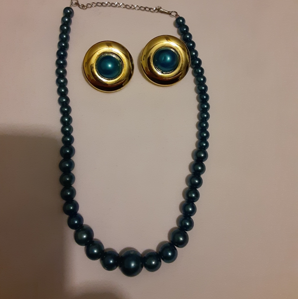 Necklace with clip on earings.